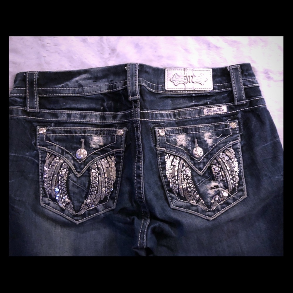 Miss Me jeans. Wings on pockets.